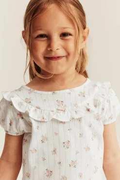 Kukallinen röyhelösomisteinen pyjama | Luonnonvalkoinen | Lapset | Newbie
