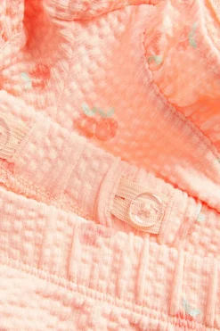 Persikkakuvioiset shortsit röyhelöreunalla | Koralli | Lapset | Kappahl