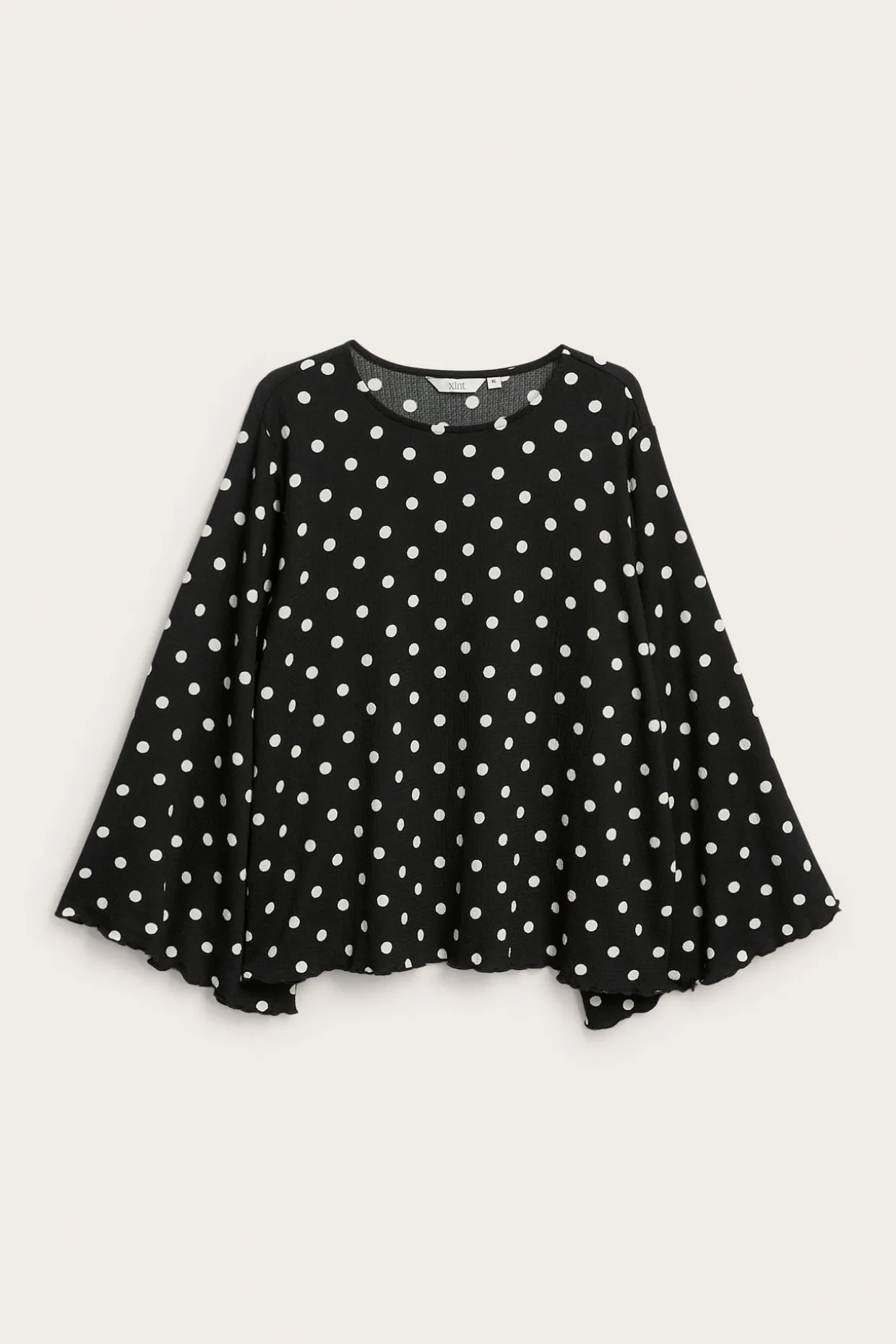 Pilkullinen paita, jossa on leveät hihat | Musta | Naiset | Kappahl