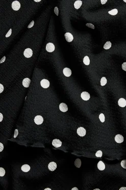 Pilkullinen paita, jossa on leveät hihat | Musta | Naiset | Kappahl