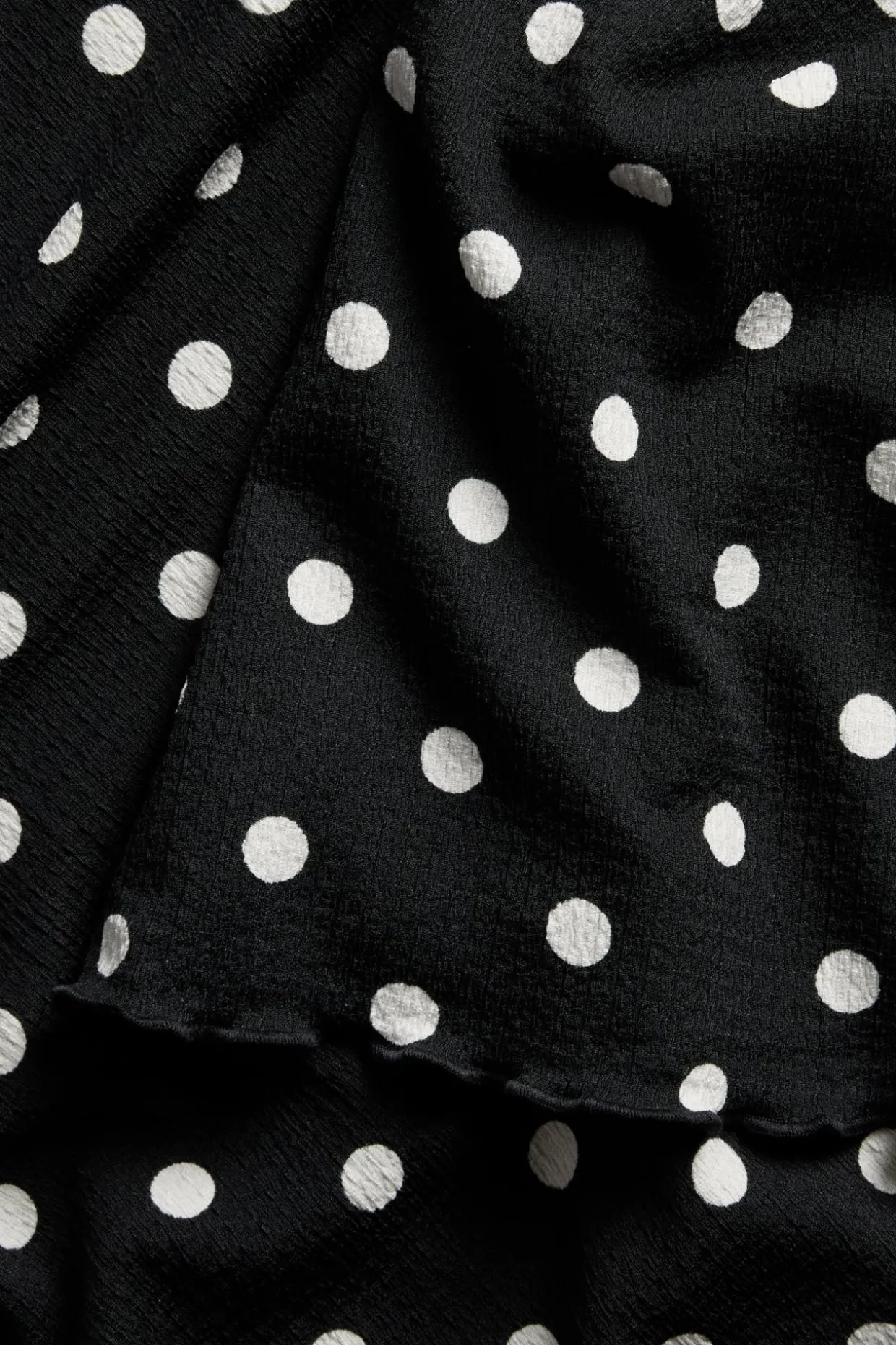 Pilkullinen paita, jossa on leveät hihat | Musta | Naiset | Kappahl
