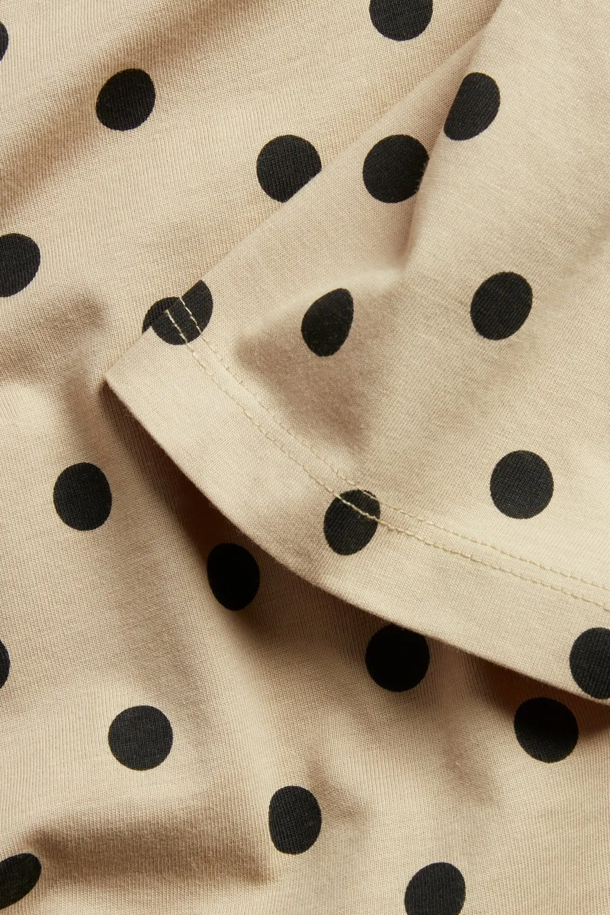 Puuvillaa oleva pistekuvioinen pitkä t-paita. | Beige | Naiset | Kappahl