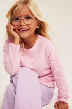 Puuvillatrikoota oleva pitkähihainen oversize-t-paita. | Pinkki | Lapset | Kappahl