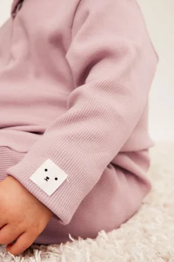 Ribattu haalariasu, jossa on käännettävät resorit. | Pinkki | Vauvat | Kappahl