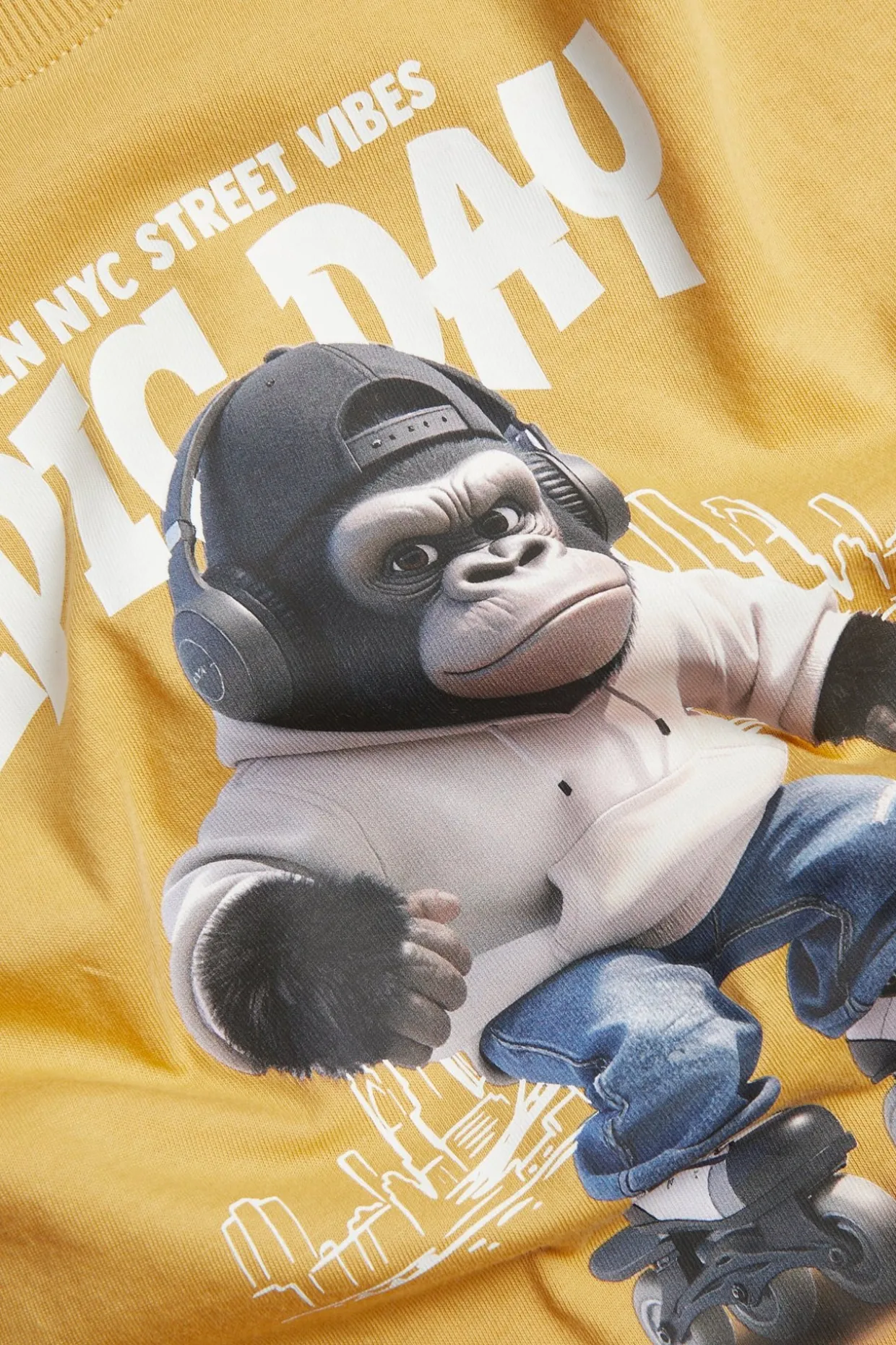 Ylisuuri t-paita, jonka etupuolella on gorillapainatus | Keltainen | Lapset | Kappahl